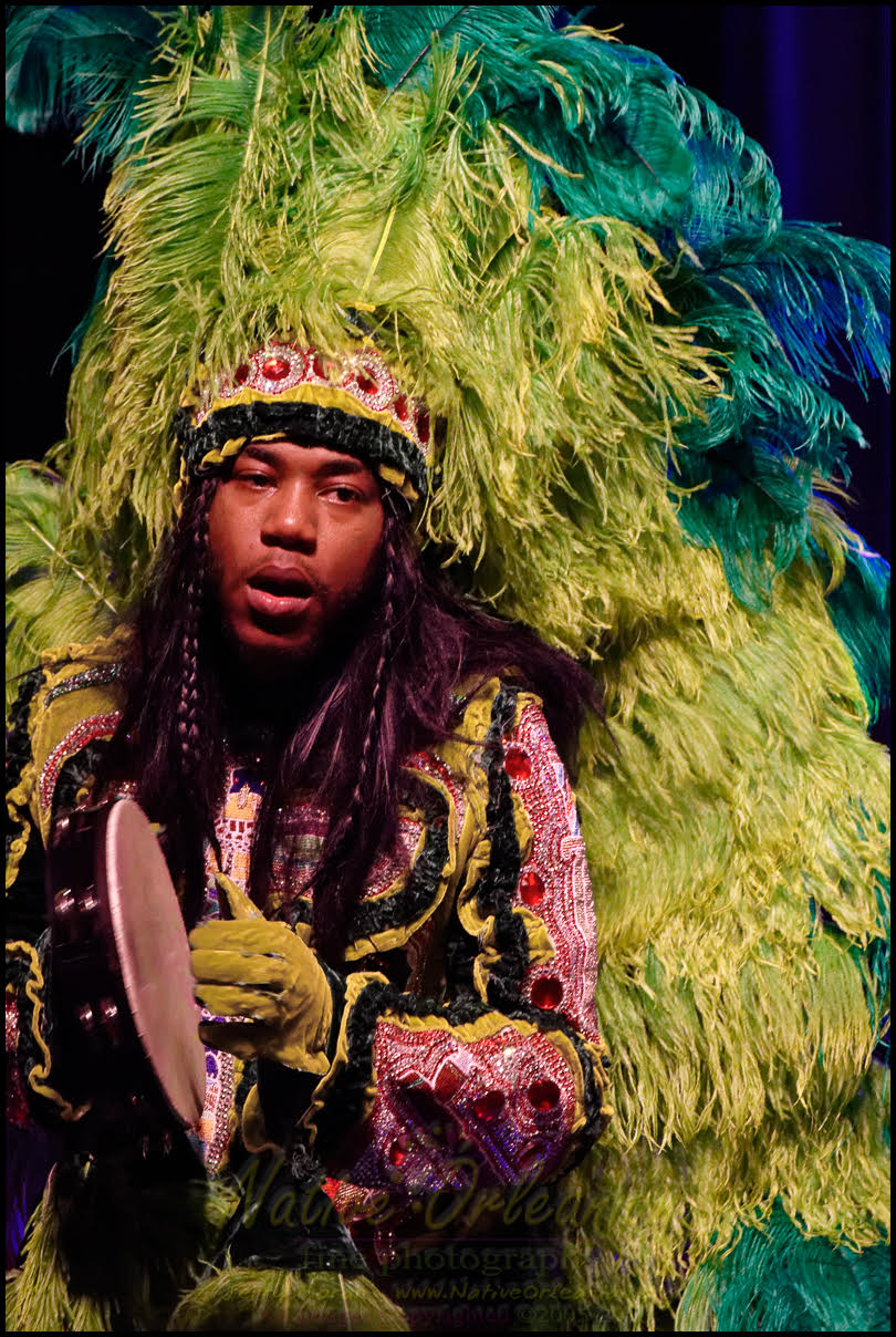 Mardi Gras Indian in green ceremonial regalia