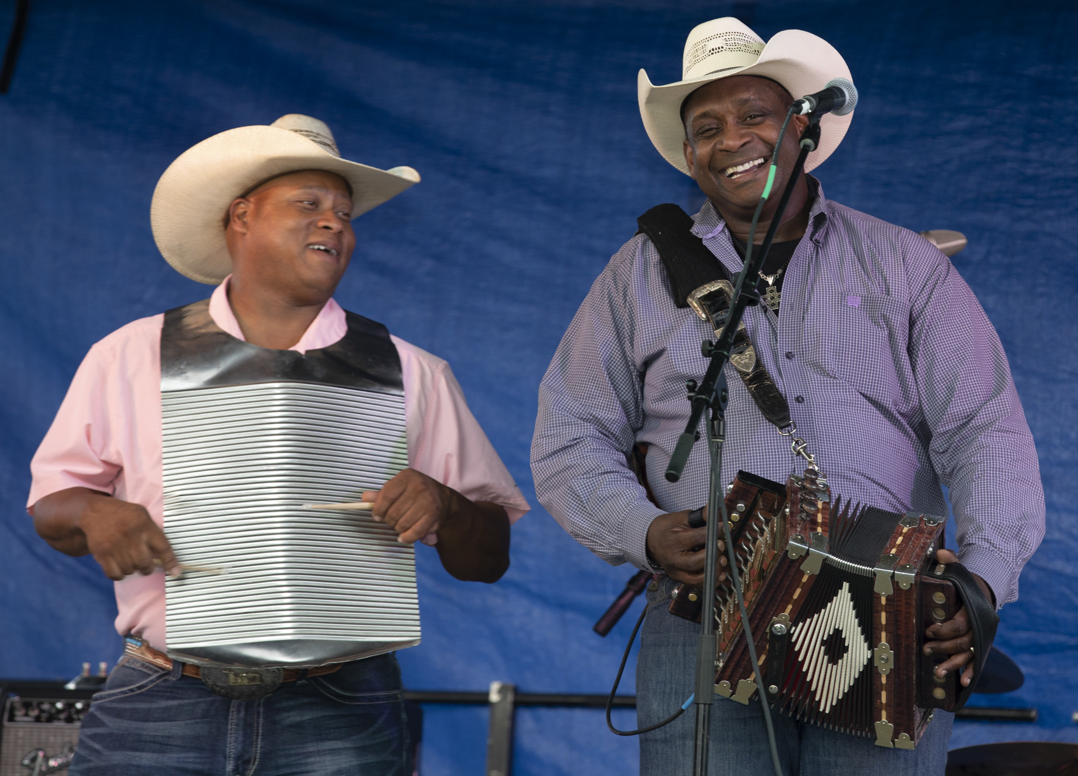 Louisiana regional musicians performing zydeco music with accordion and washboard